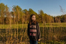 Ava in her backyard in March. (Will Crooks for The Washington Post)