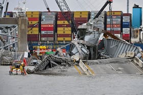 A diver prepares to enter the water on April 4 at the site of the Key Bridge collapse in Baltimore.