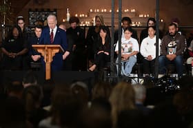 President Biden leads a moment of silence during a vigil last year for victims of gun violence.